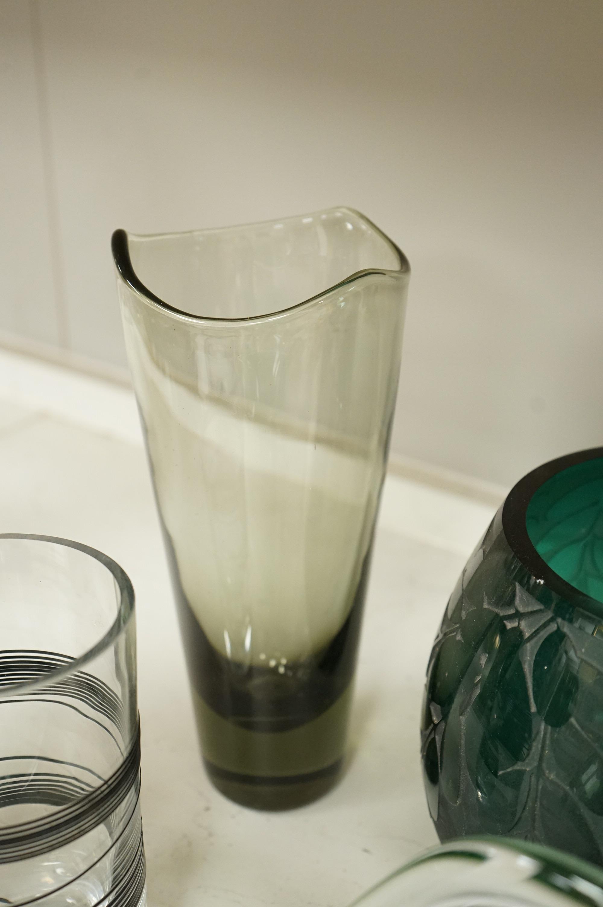 Bertil Vallien for Kosta Boda, an art glass bowl and vase, Holmegaard smoke-glass vase, Ken Benson vase and two other items, largest 31cm wide